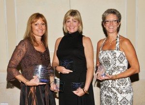 Gail Drury, CMKBD, Tina Muller and Terry Kenny accepting Design Vision awards on behalf of Drury Design Kitchen and Bath Studio for client projects in Burr Ridge, Glen Ellyn, Hinsdale, La Grange and Lisle