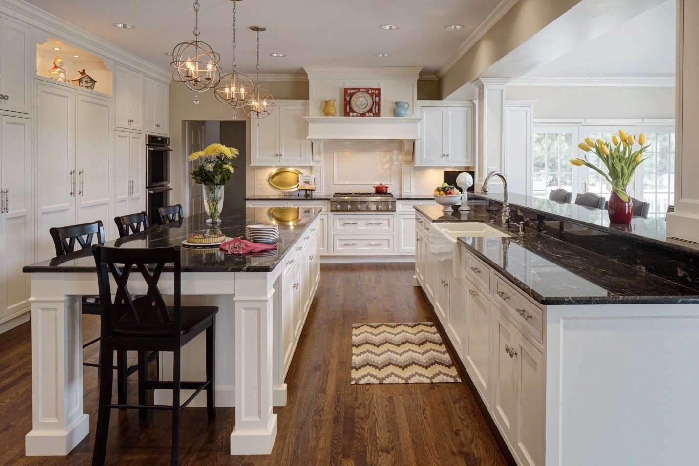 better together kitchen with light cabinets and dark countertops