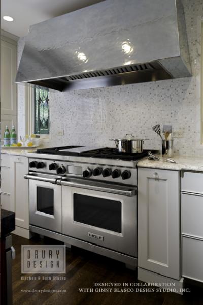 CUSTOM HAMMERED ZINC HOOD IN TRANSITIONAL KITCHEN DESIGN