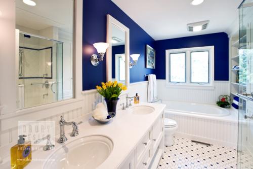 White and Blue Traditional Bath Design by Drury Design with Corian Countertop