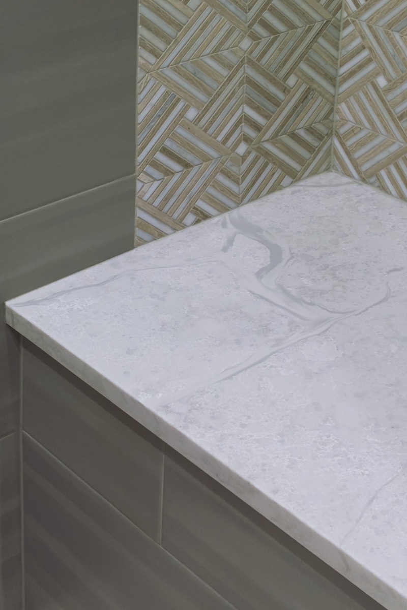 refined_simple_primary_bath_refresh_tile_plumbing_drurydesign_copyright_2025