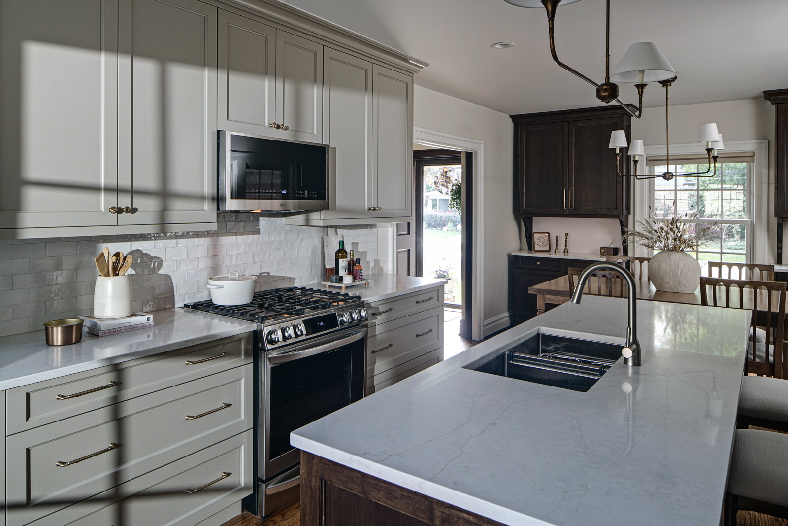 Classic-Revival_Chicago_1920s-Home-Kitchen_Drury-Design_Copyright-2025_Range-Island-Dining-Area