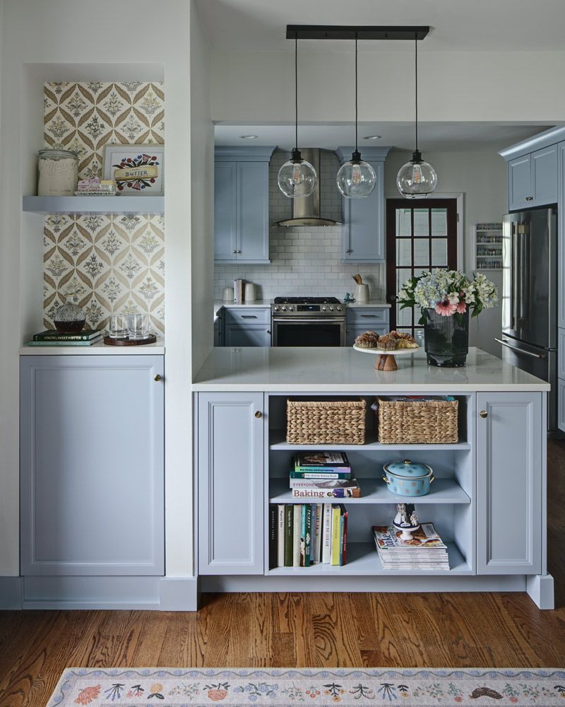 Drury-Design_Lombard_Copyright-2026_Blue-Kitchen_Dining-Area-Facing-Cabinetry-Open-Shelves